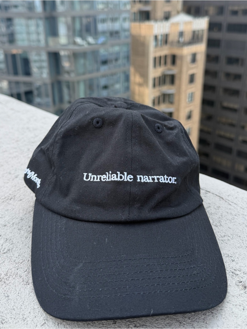 Black 'Unreliable Narrator' Embroidered Dad Hat - Book of the Month Club